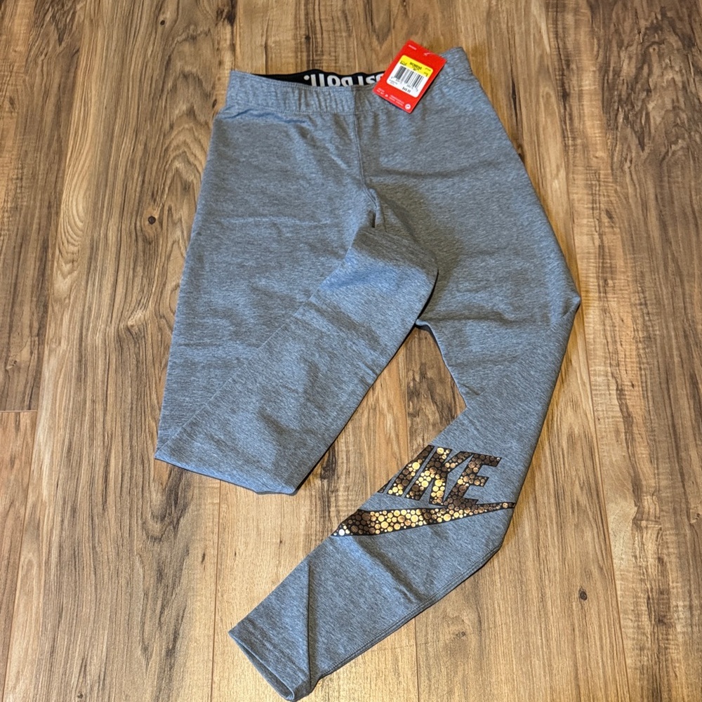 Nike Women’s Gray Leggings with Metallic Gold Logo Detail